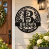 Custom family name metal art sign personalized with last name and established year, outdoor wall decor for porches, homes, weddings and housewarming gifts.