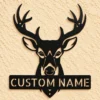 Custom deer buck antlers metal sign personalized with a name, featuring laser-cut hunting wall art for rustic cabins, lodges, garages, and man caves.